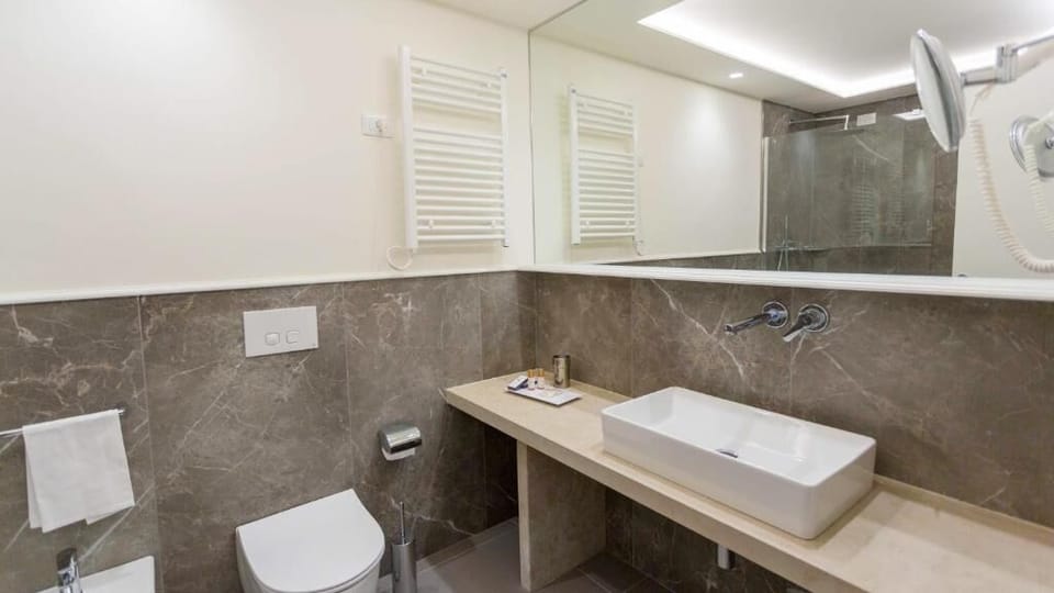 Deep soaking tub, rainfall showerhead, free toiletries, hair dryer