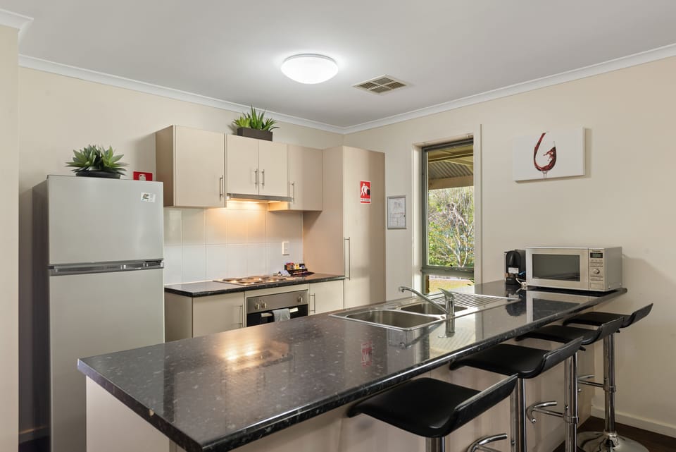 Deluxe 3 Bedroom House - Sleeps 6 | Private kitchen | Fridge, microwave