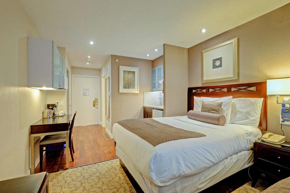 Premium bedding, pillowtop beds, desk, blackout drapes