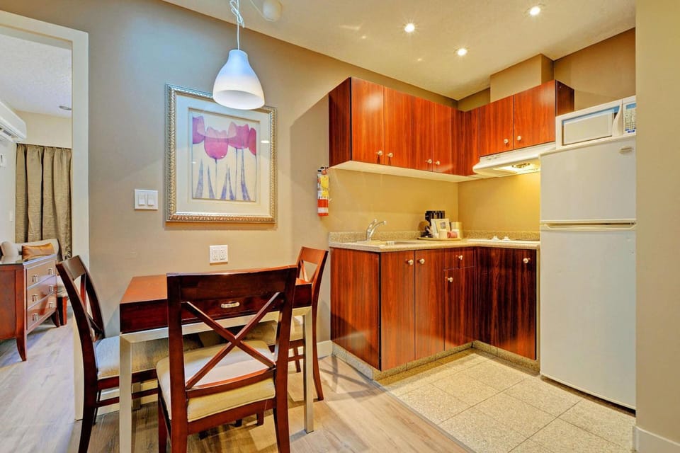 Fridge, microwave, cookware/dishes/utensils