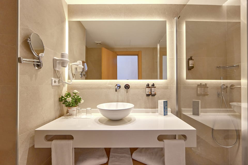 Eco-friendly toiletries, hair dryer, towels, soap