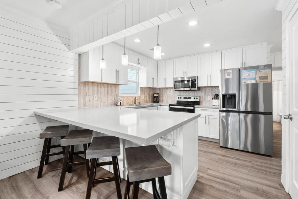 Spacious Kitchen With Bar Seating