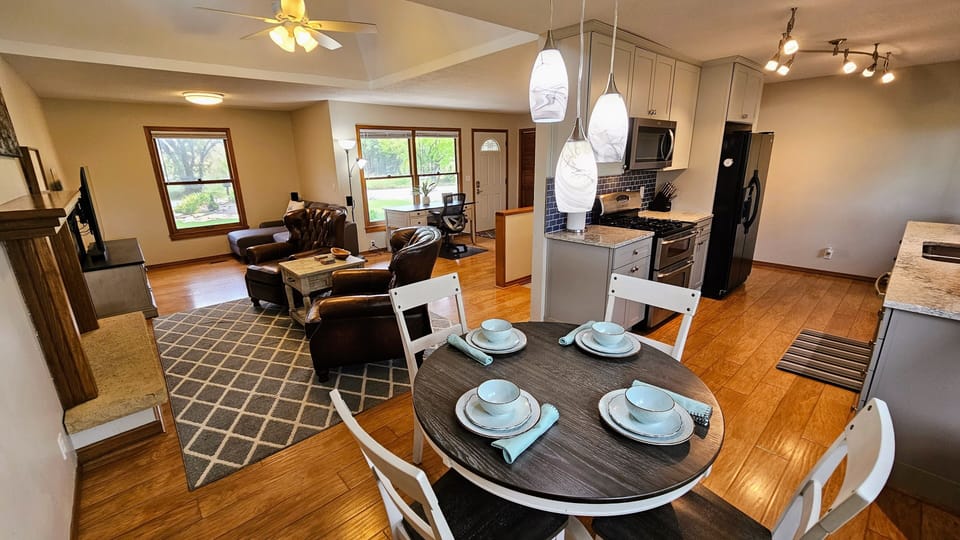 Open concept dining with lake views through the large picture window