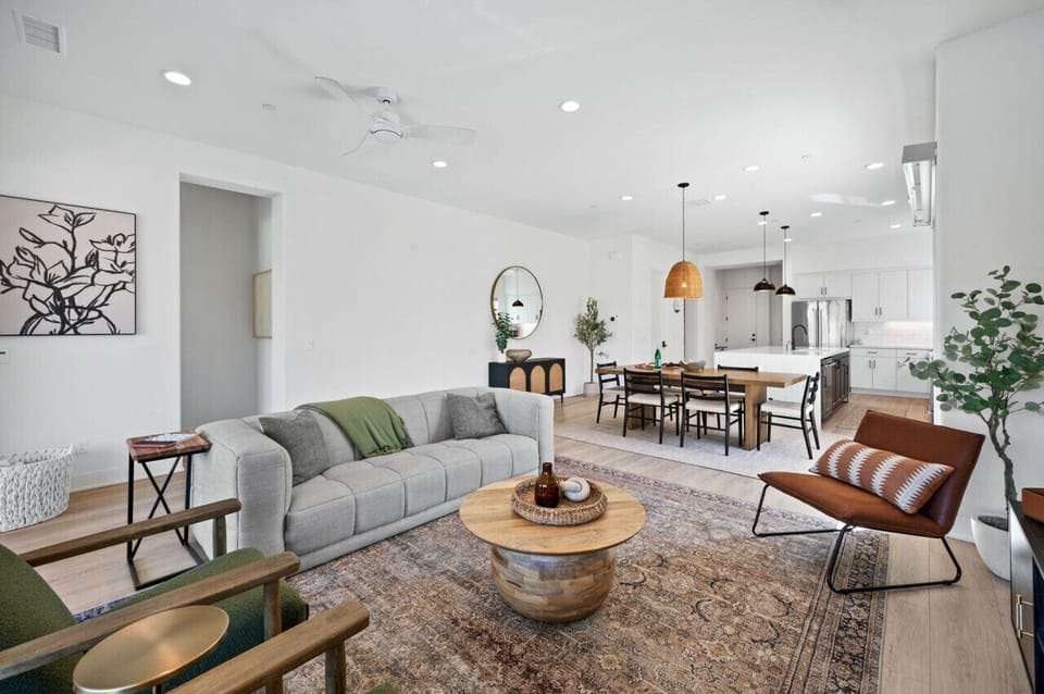 Open living & dining space w/ comfortable seating, perfect for gathering & relaxing
