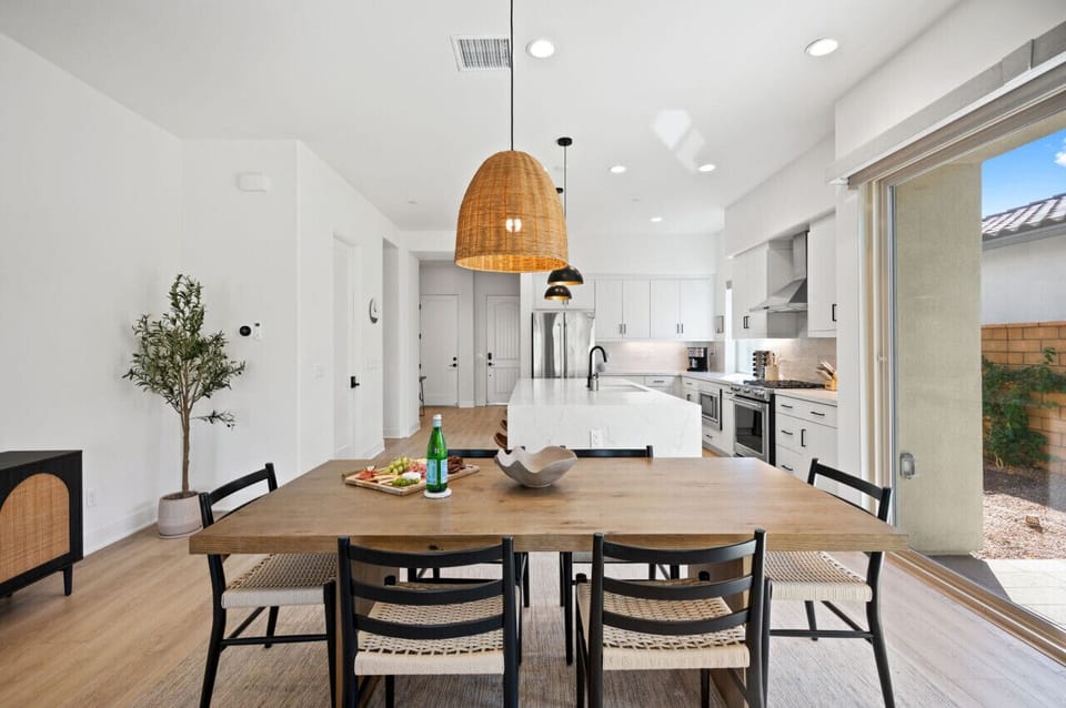Spacious dining area flowing into the kitchen, perfect for shared meals