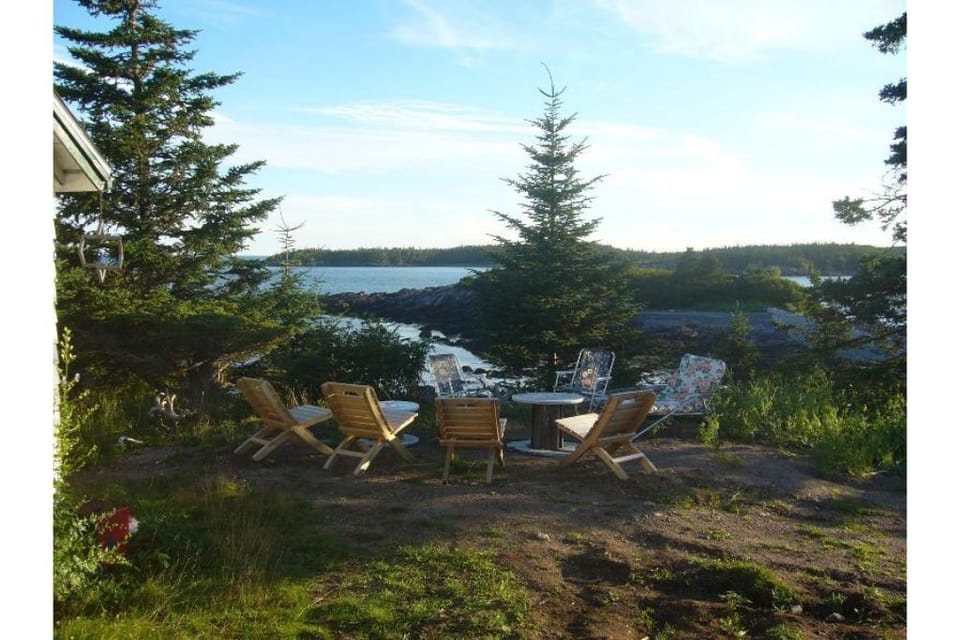 Firepit area outside Cottage at top of hill