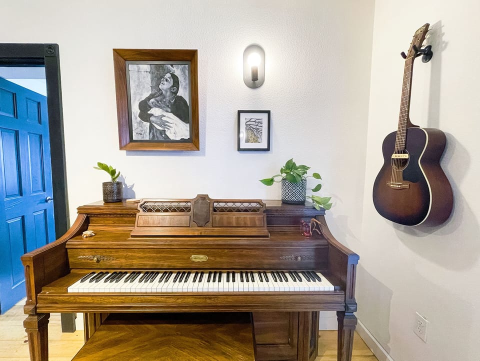 Upright piano and acoustic guitar for the musician in your group.