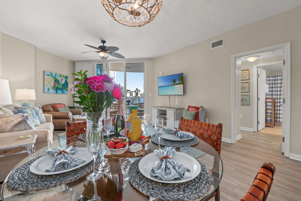 Dining room seating for 4 with 3 additional seating at the kitchen Island