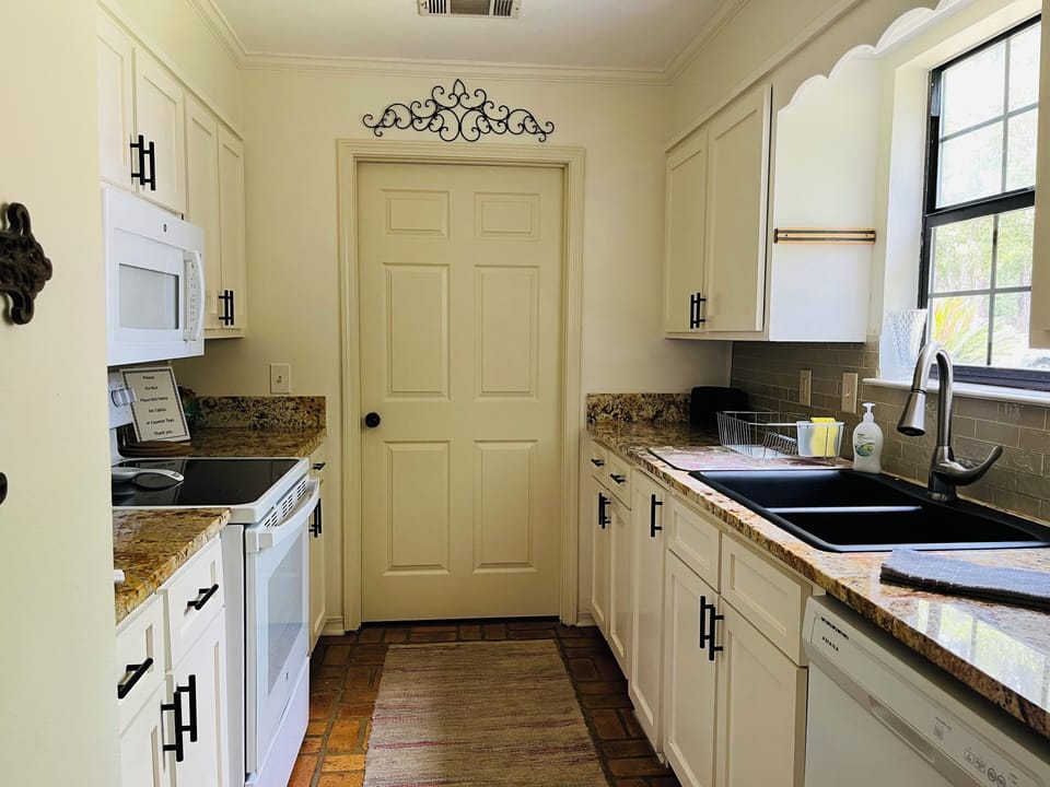 Galley-style kitchen with ample counter space for meal (or snack) prep
