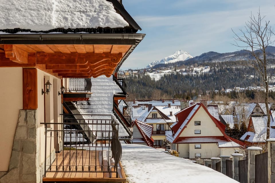 The balcony provides a perfect spot for enjoying the fresh air. 