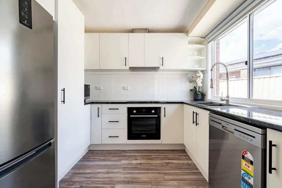 Kitchen stocked with larger utensils, cutlery for a big family. You will have access to all appliances including air fryer, pressure cooker, blender, kettle, toaster, coffeee maker and tea, coffee, sugar.