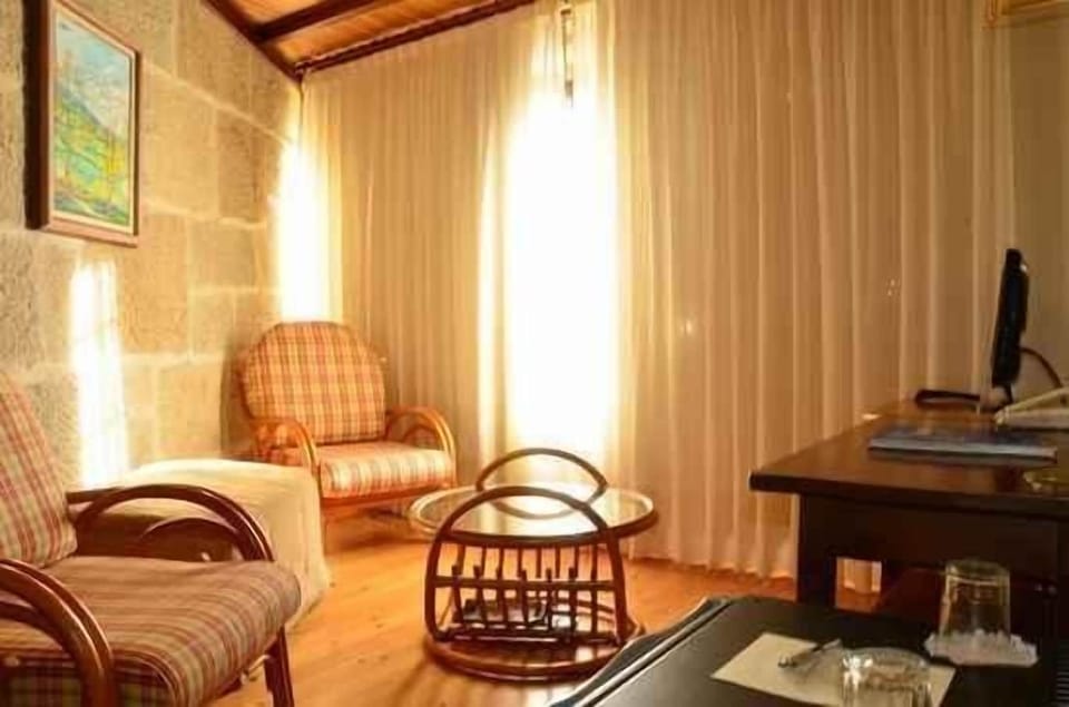 Superior Room | Living area | Flat-screen TV