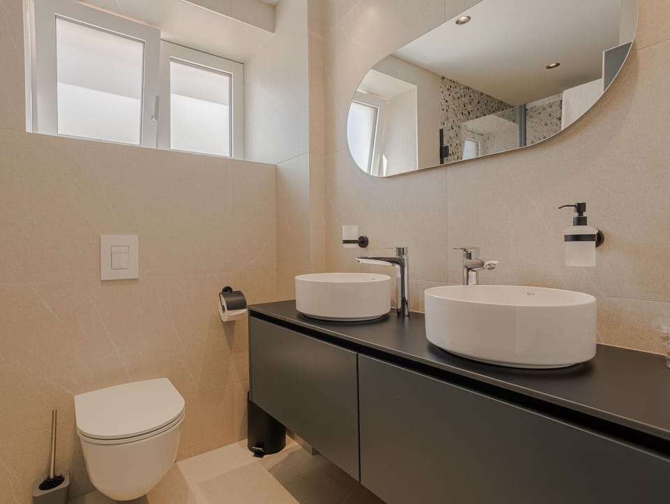Superior Room, 1 King Bed | Bathroom | Shower, rainfall showerhead, hair dryer, bathrobes