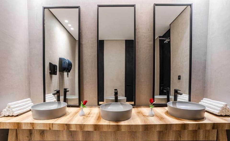 Classic Room, Multiple Beds | Bathroom | Shower, free toiletries, hair dryer, bathrobes
