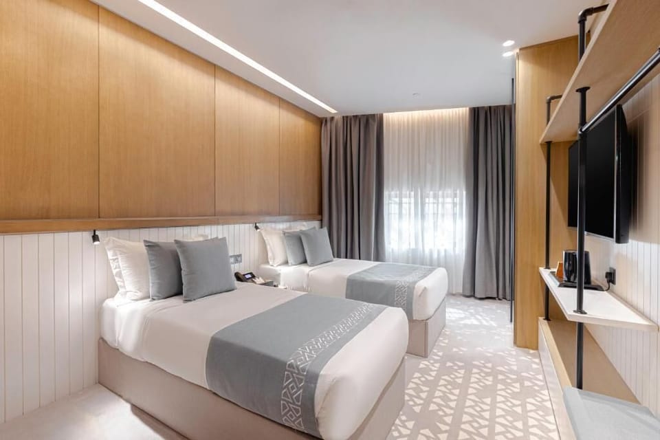 Classic Room, 2 Twin Beds | Down comforters, in-room safe, soundproofing