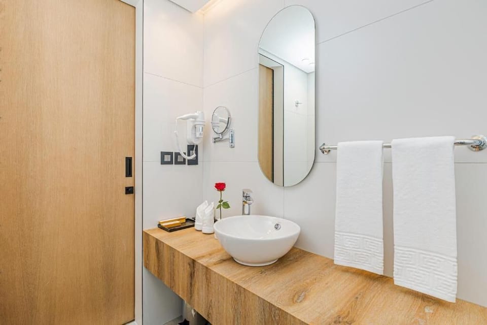 Classic Room, Multiple Beds | Bathroom | Shower, free toiletries, hair dryer, bathrobes