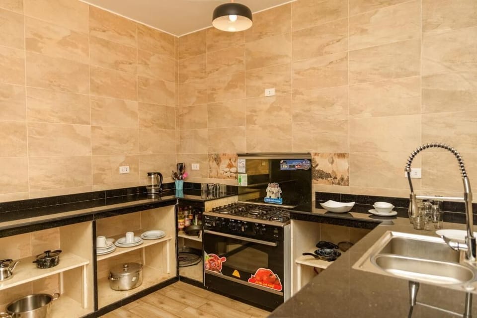 Standard Villa | Private kitchen | Fridge, oven, stovetop, coffee/tea maker