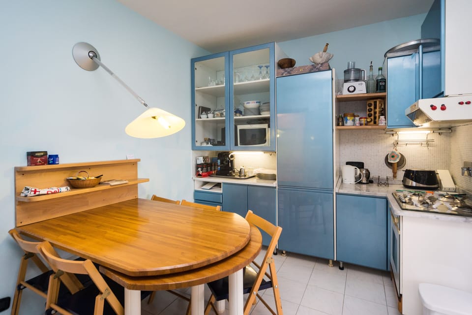 Espresso maker, electric kettle, highchair, dining tables