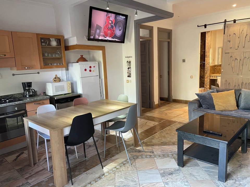 Design Apartment | Private kitchen | Espresso maker, coffee/tea maker, electric kettle, dining tables