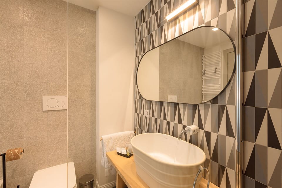 Superior Room | Bathroom | Shower, rainfall showerhead, eco-friendly toiletries, hair dryer