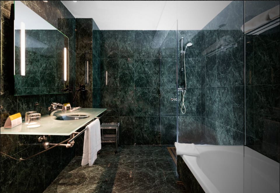Shower, eco-friendly toiletries, hair dryer, bidet