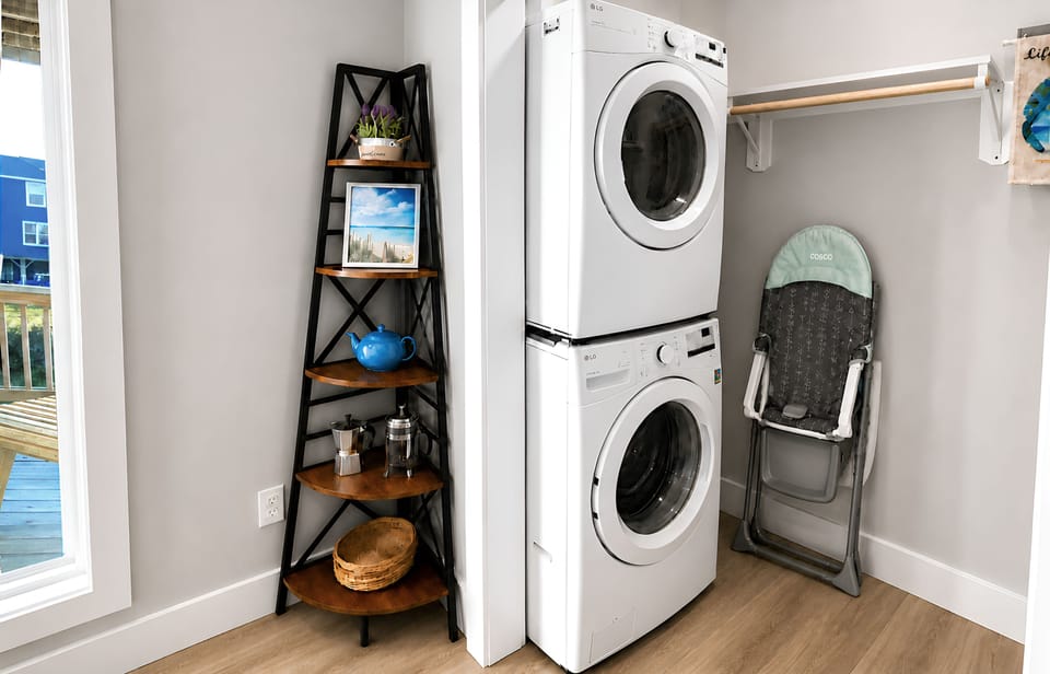 Full-size laundry and a high chair make family beach stays stress-free.