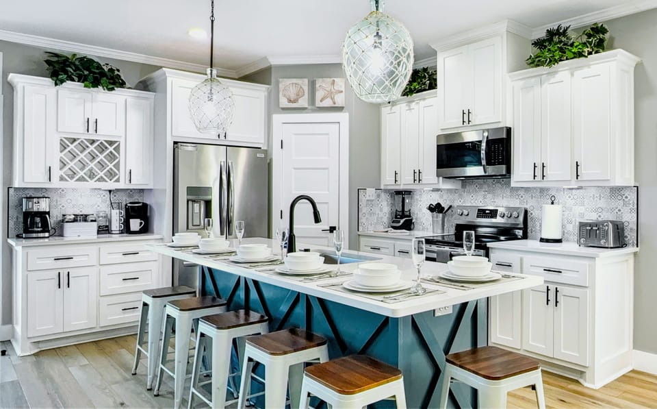 Dream kitchen: stocked pantry, stainless appliances, quartz island seats six!