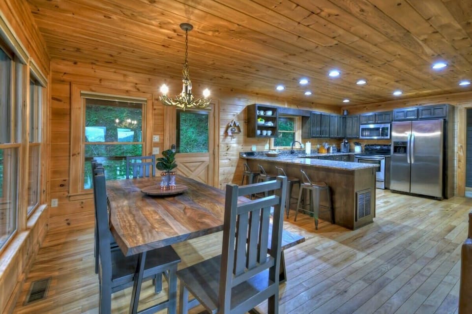 Dining area and fully stocked kitchen