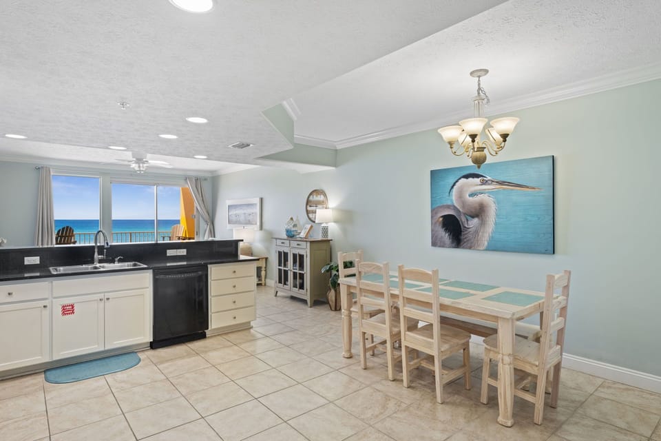 Enjoy family meals in the dining area just steps from the open kitchen