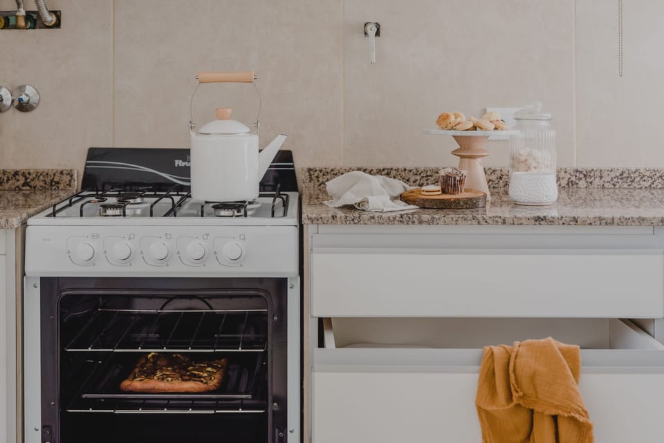Design Apartment | Private kitchen | Full-size fridge, microwave, oven, coffee/tea maker