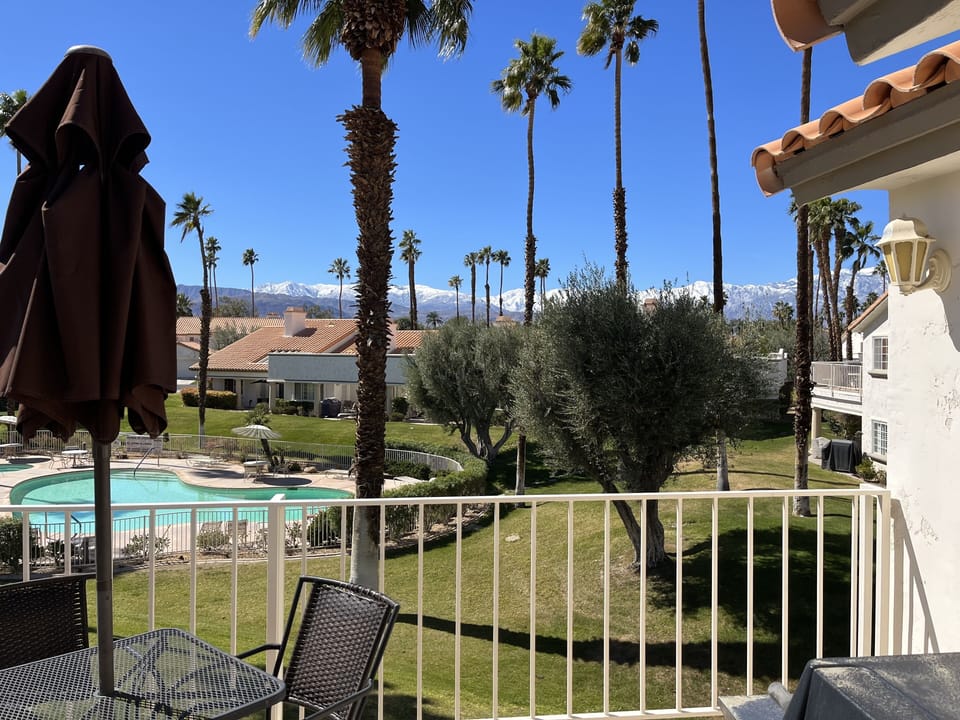 Patio overlooking community pool
