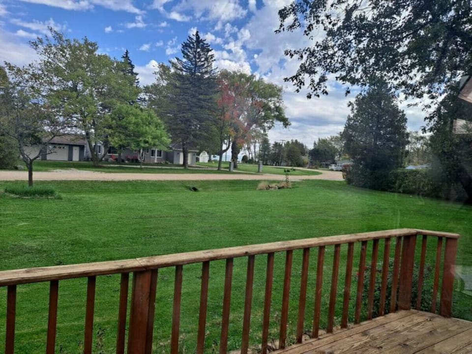 Front yard view from the deck.  Lots of beautiful trees!