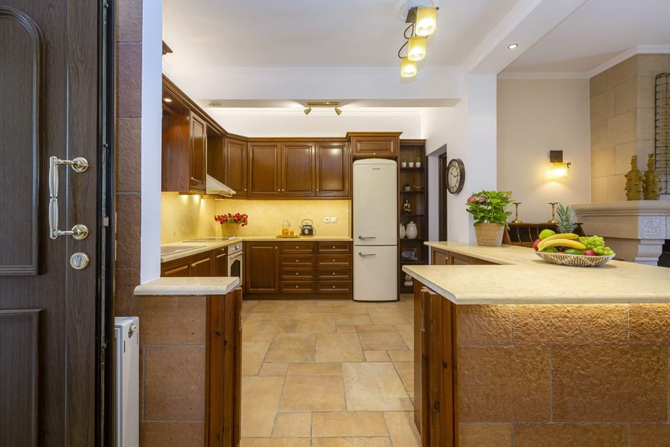 Villa | Private kitchen | Electric kettle, toaster, highchair, eco-friendly cleaning products