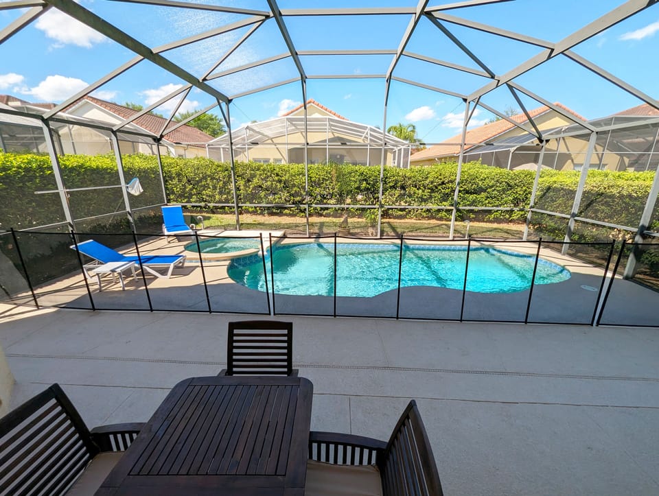 Beautiful pool deck with dining area