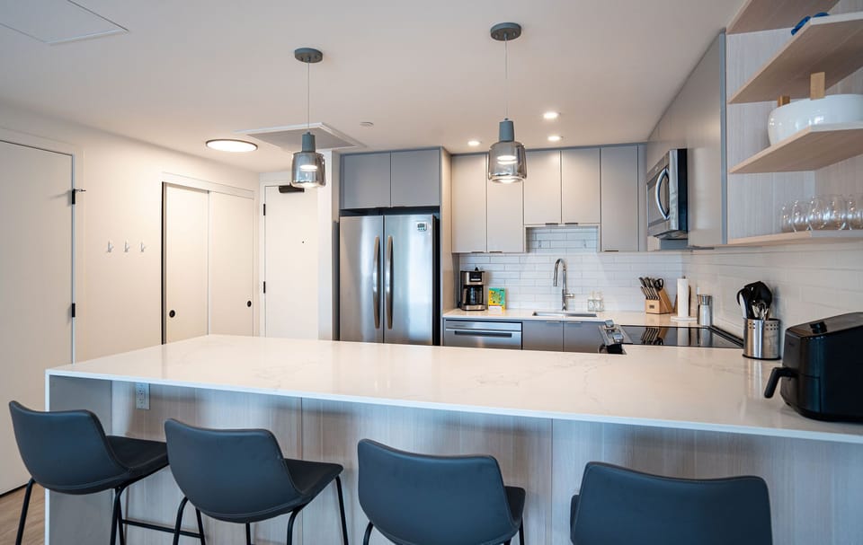 Condo | Private kitchen | Coffee/tea maker, full-size fridge, microwave, oven