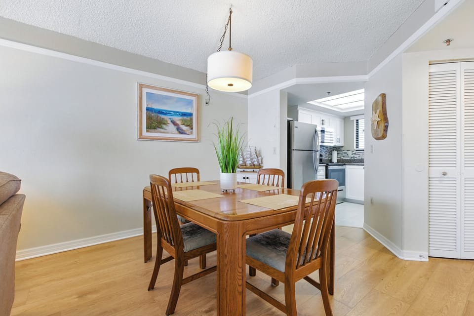 Dining room table with room to fit 4 people.