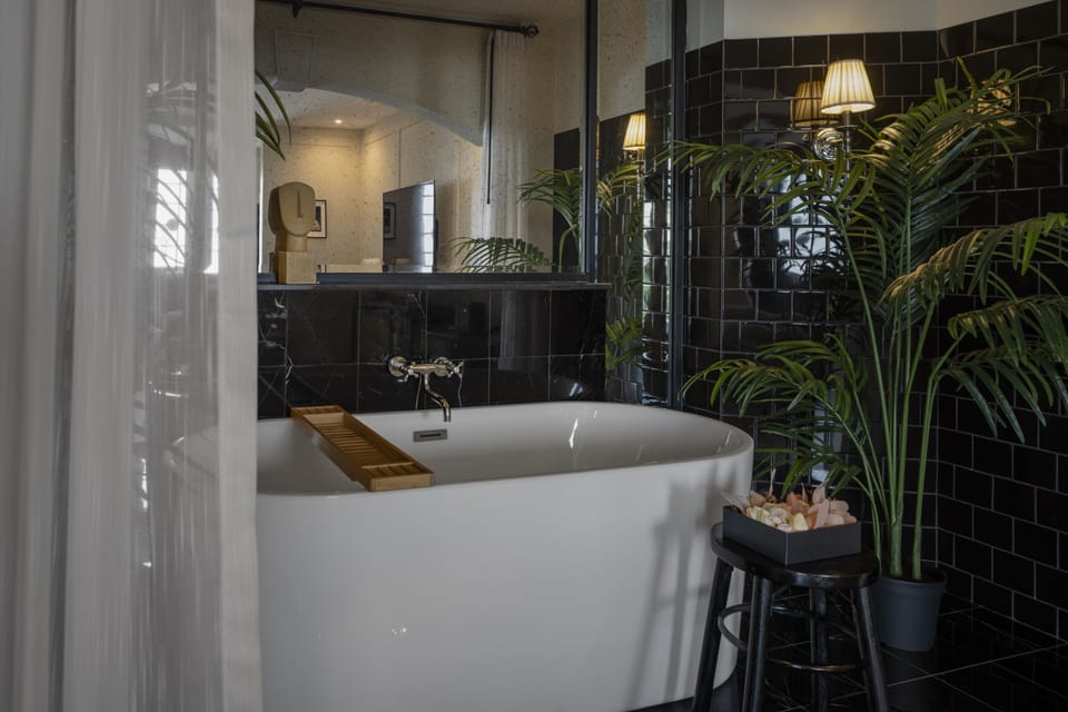 Suite | Bathroom | Separate tub and shower, rainfall showerhead, free toiletries