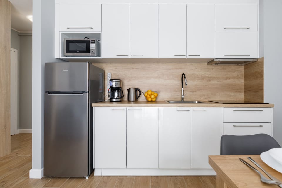 The kitchenette's practical layout maximizes space and functionality.