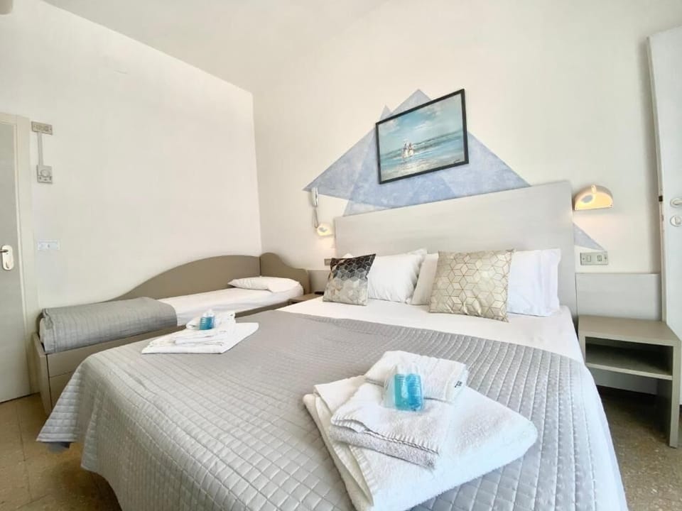 Desk, laptop workspace, free WiFi, bed sheets