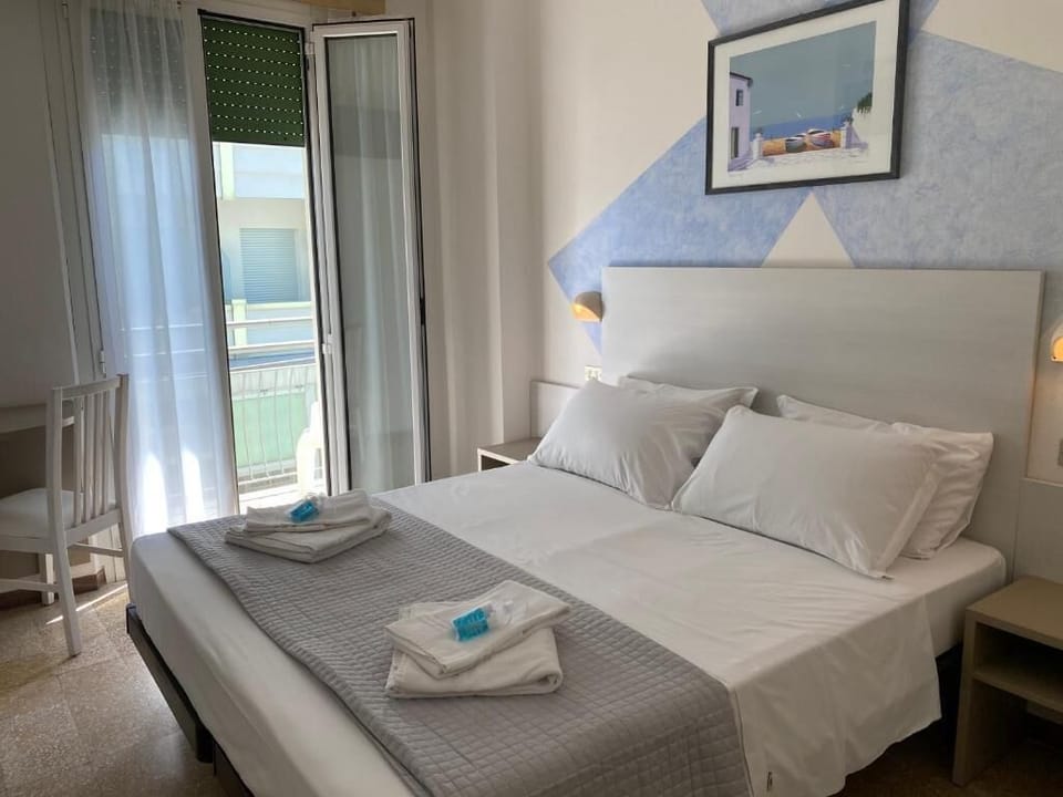 Desk, laptop workspace, free WiFi, bed sheets
