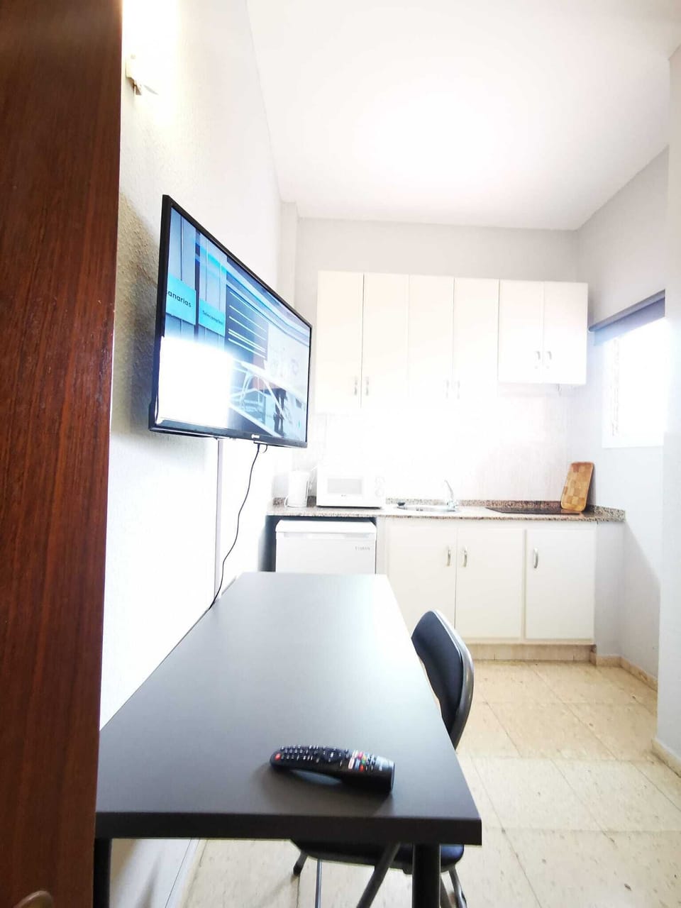 Studio | Private kitchen | Fridge, highchair