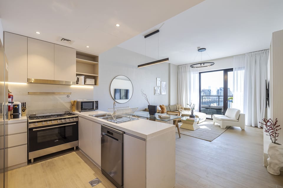 Panoramic Apartment | Private kitchen | Full-size fridge, microwave, oven, stovetop