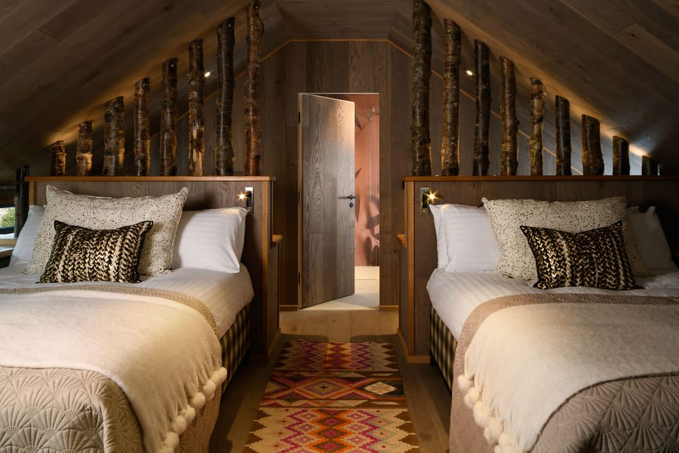 Pole Barn Family Room | Premium bedding, pillowtop beds, individually decorated