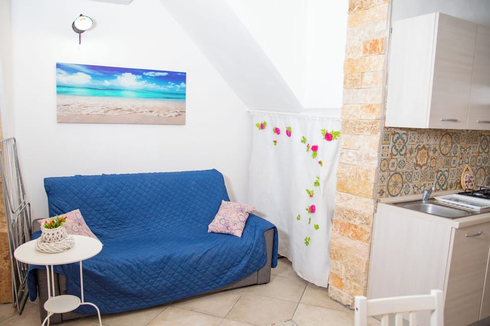 Family Apartment, Multiple Bedrooms, Sea Facing (Tiche Home 200m From Sea) | Living area | Flat-screen TV