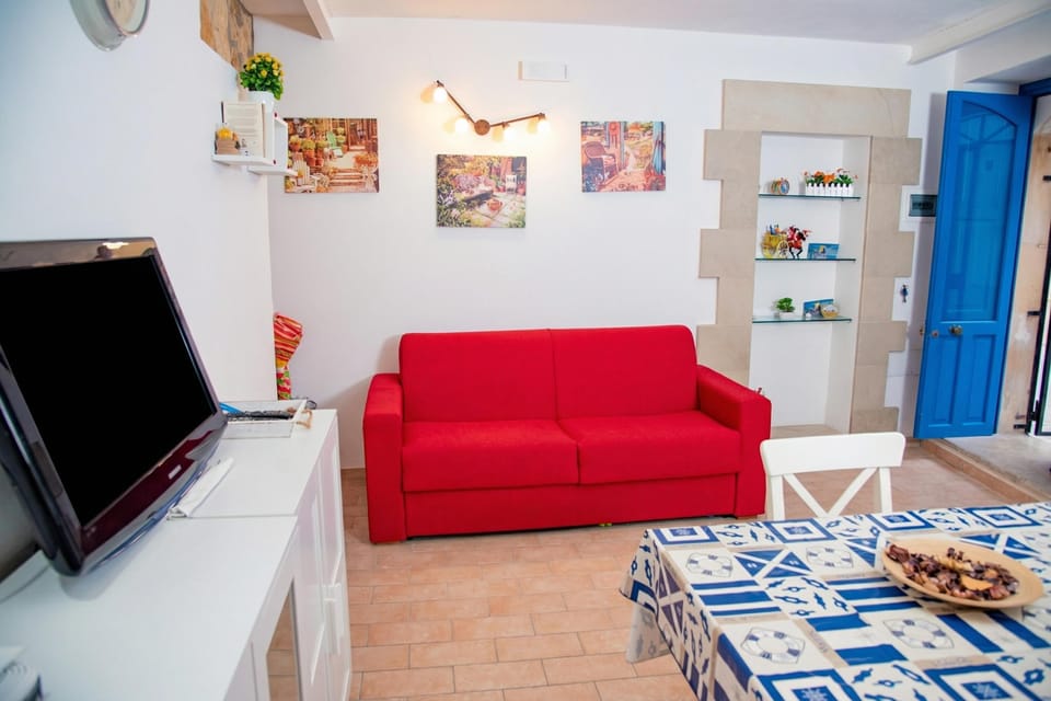 Family Apartment, Multiple Bedrooms, Sea Facing (Casa Demetra 200m from sea) | Living area | 21-inch flat-screen TV with cable channels