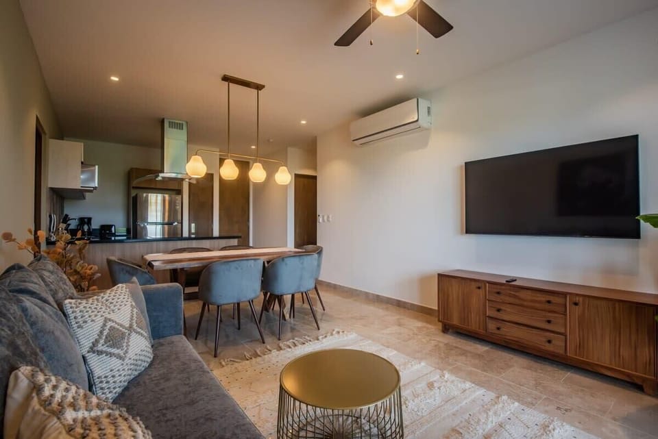 Open living area with a wall-mounted TV