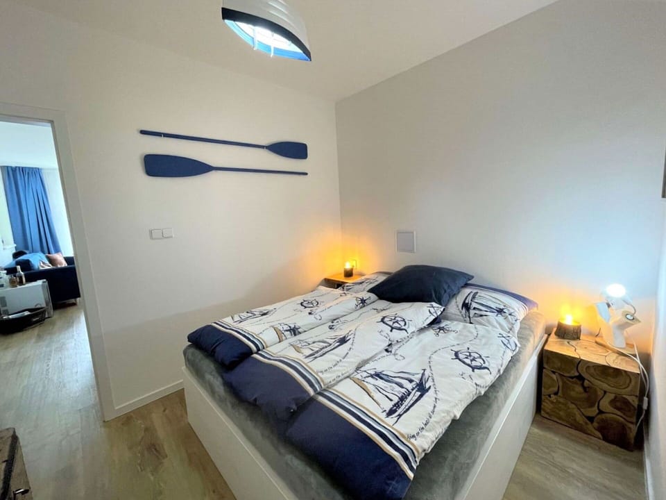 Furniture, Property, Comfort, Blue, Azure, Building, Wood, Interior Design, Flooring, Bed Frame