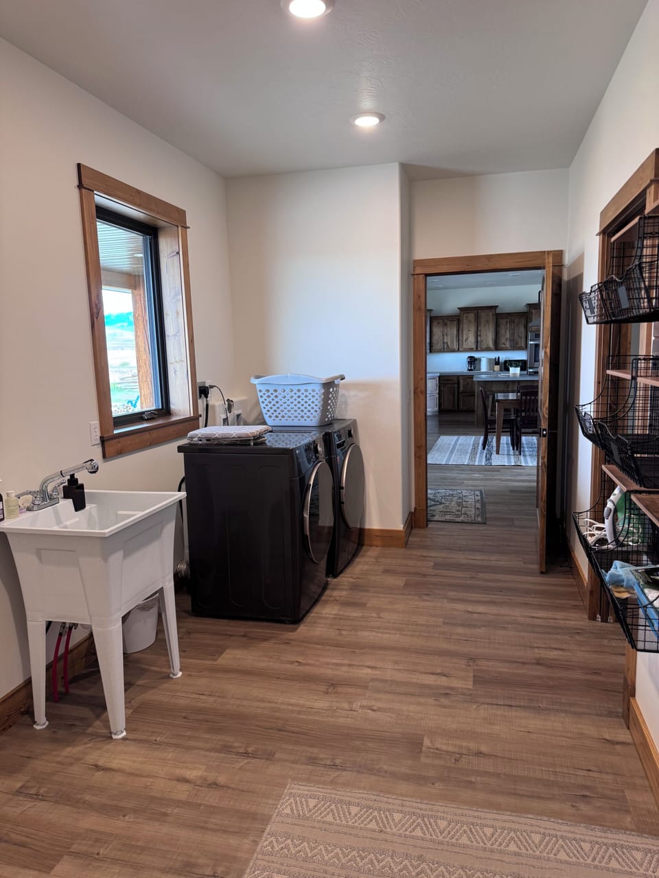 Laundry room - has half bathroom attached to it.