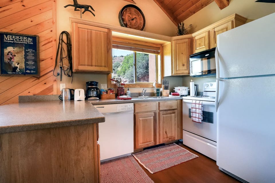 Kitchen with all necessary amenities. 