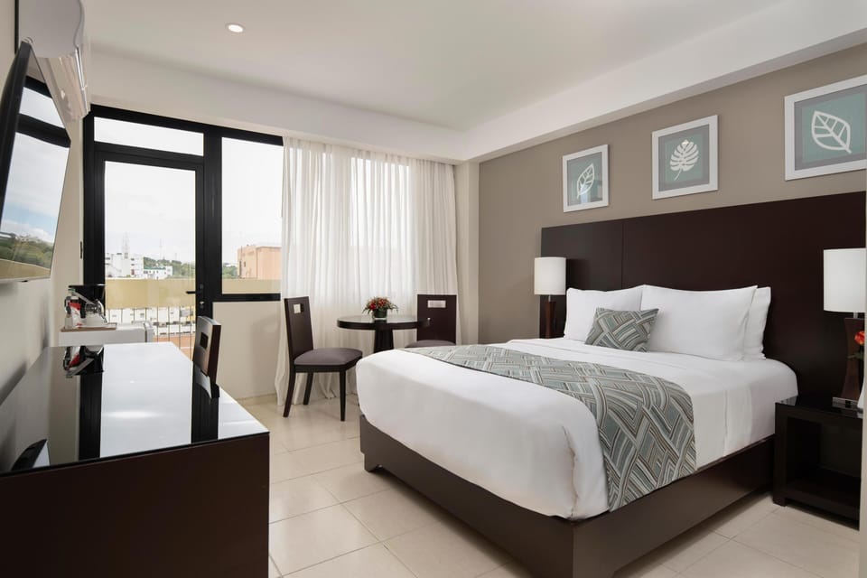 Executive Double Room | Pillowtop beds, minibar, in-room safe, desk